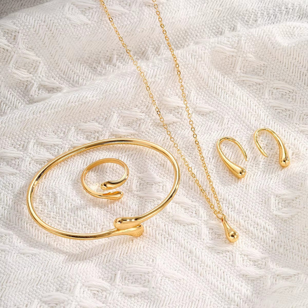 Parure Goutte d’Eau Élégante – Collier, Bracelet, Boucles & Bague Ajustable